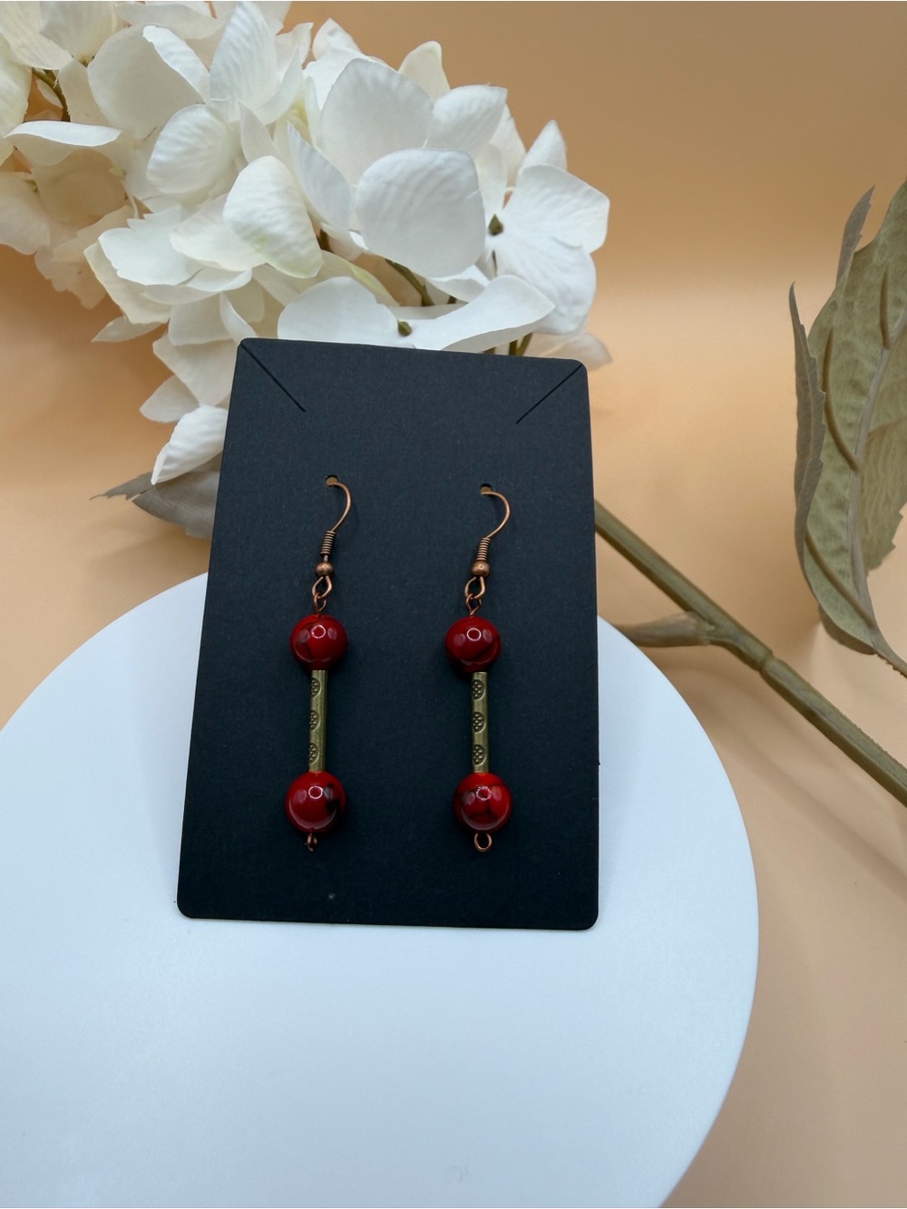Handcrafted Red Bead Drop Earrings with Antique Brass Accents